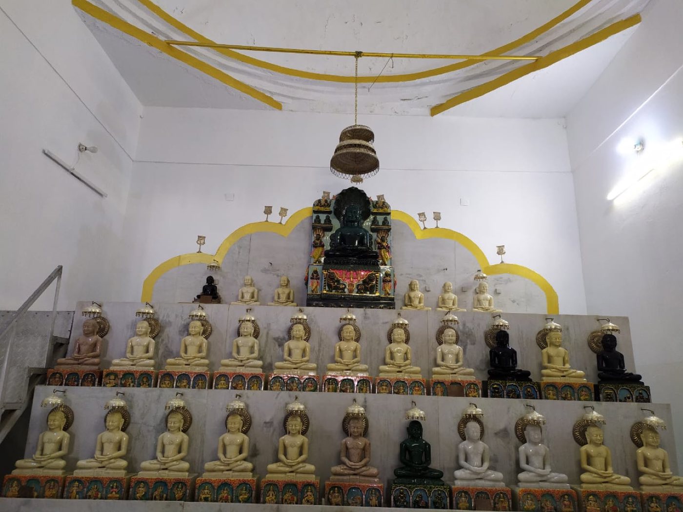 The altar of the mandir today, with rows of enshrined Tirthankara images